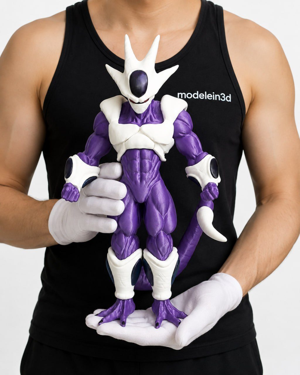 Large Cooler character figure held in hand in front of a Modelein3D shirt