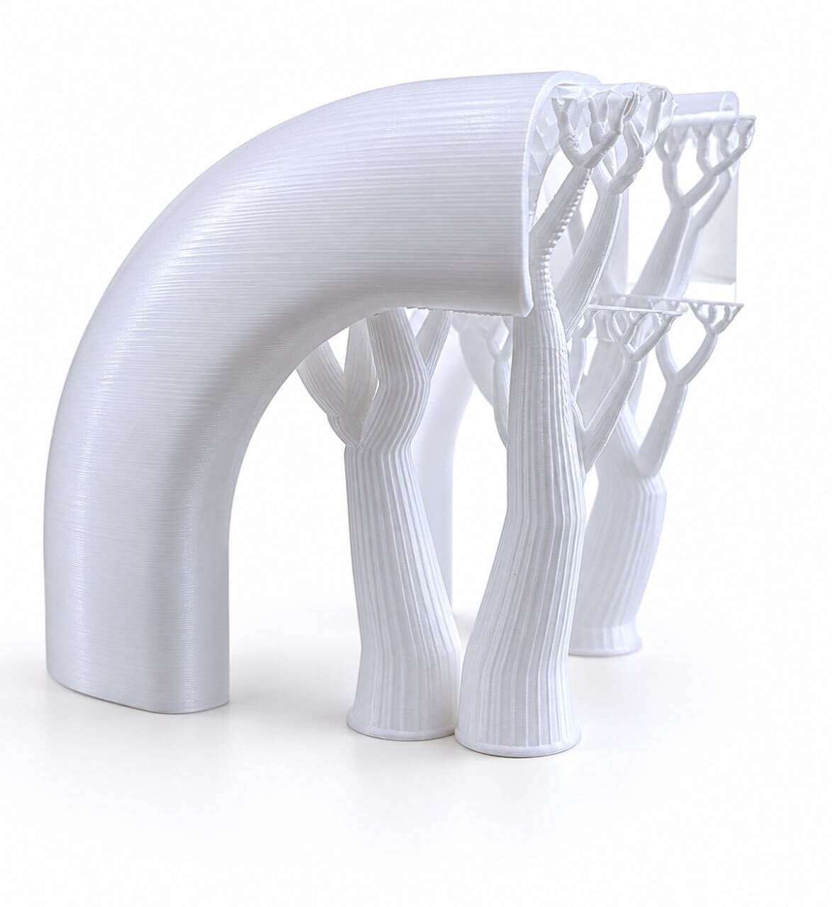 Close-up of a 3D-printed surface showing visible layer direction on curved geometry