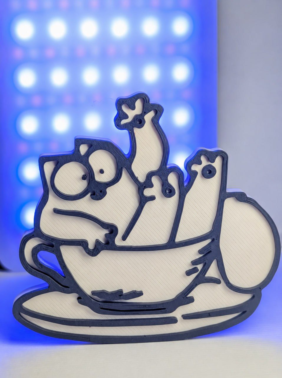 3D-printed refrigerator magnet with stacked cat characters